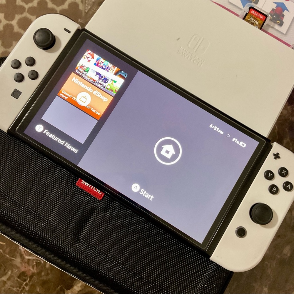Nintendo Switch OLED - Black and White with case and accessories
